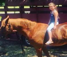 She is also an avid horseback rider.